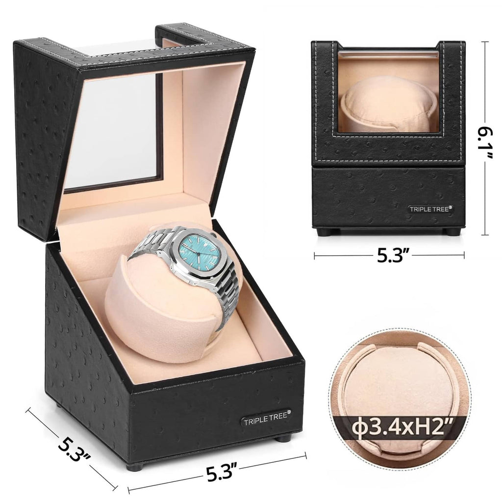 Black single watch winder with beige pillow, open lid, and wristwatch on display