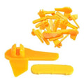 Yellow plastic tire rim protector inserts, curved and prong-style tabs for wheel edges