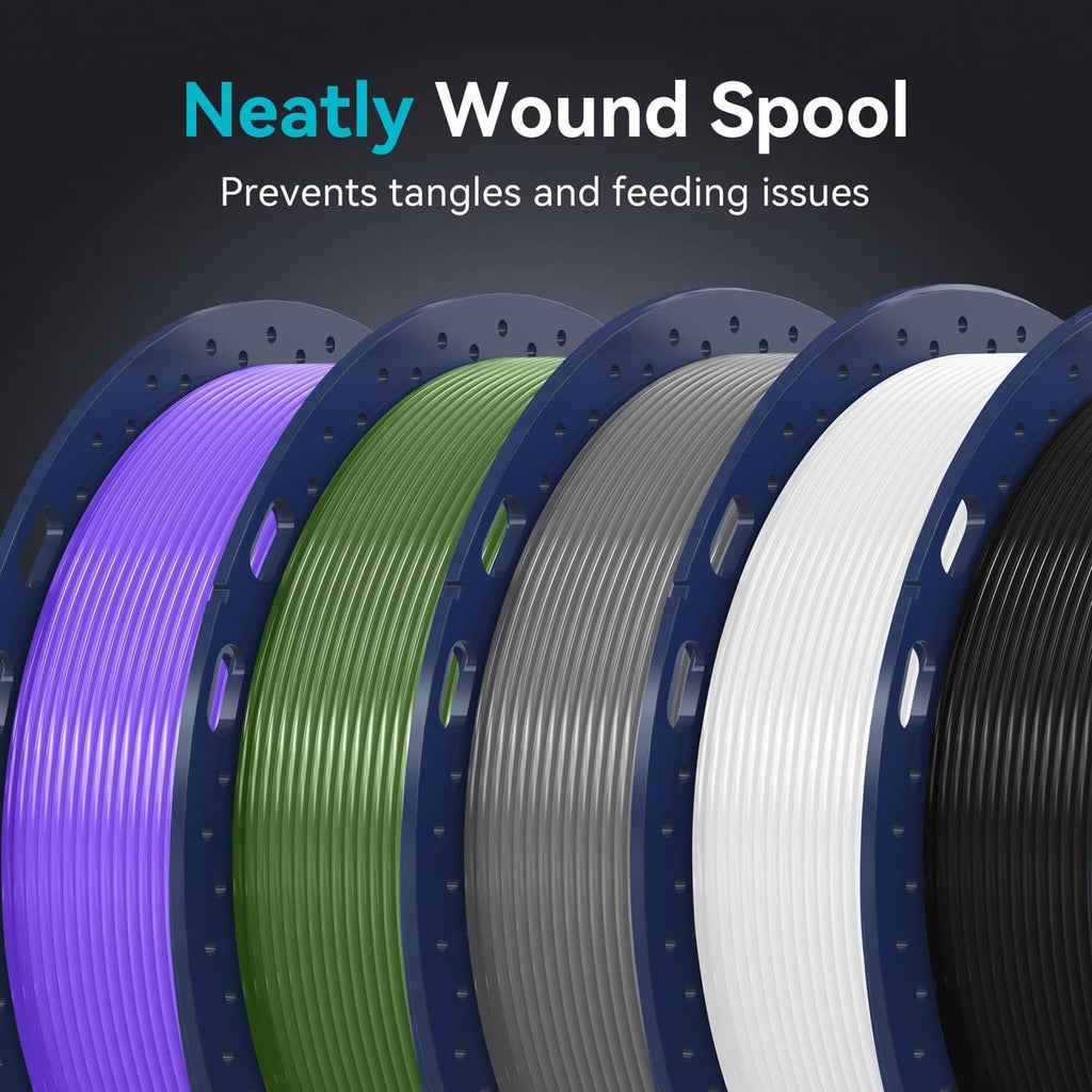 Neatly wound filament spools close-up, green and purple rolls with blue rims