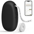 Black portable Bluetooth label maker with tape roll and smartphone preview