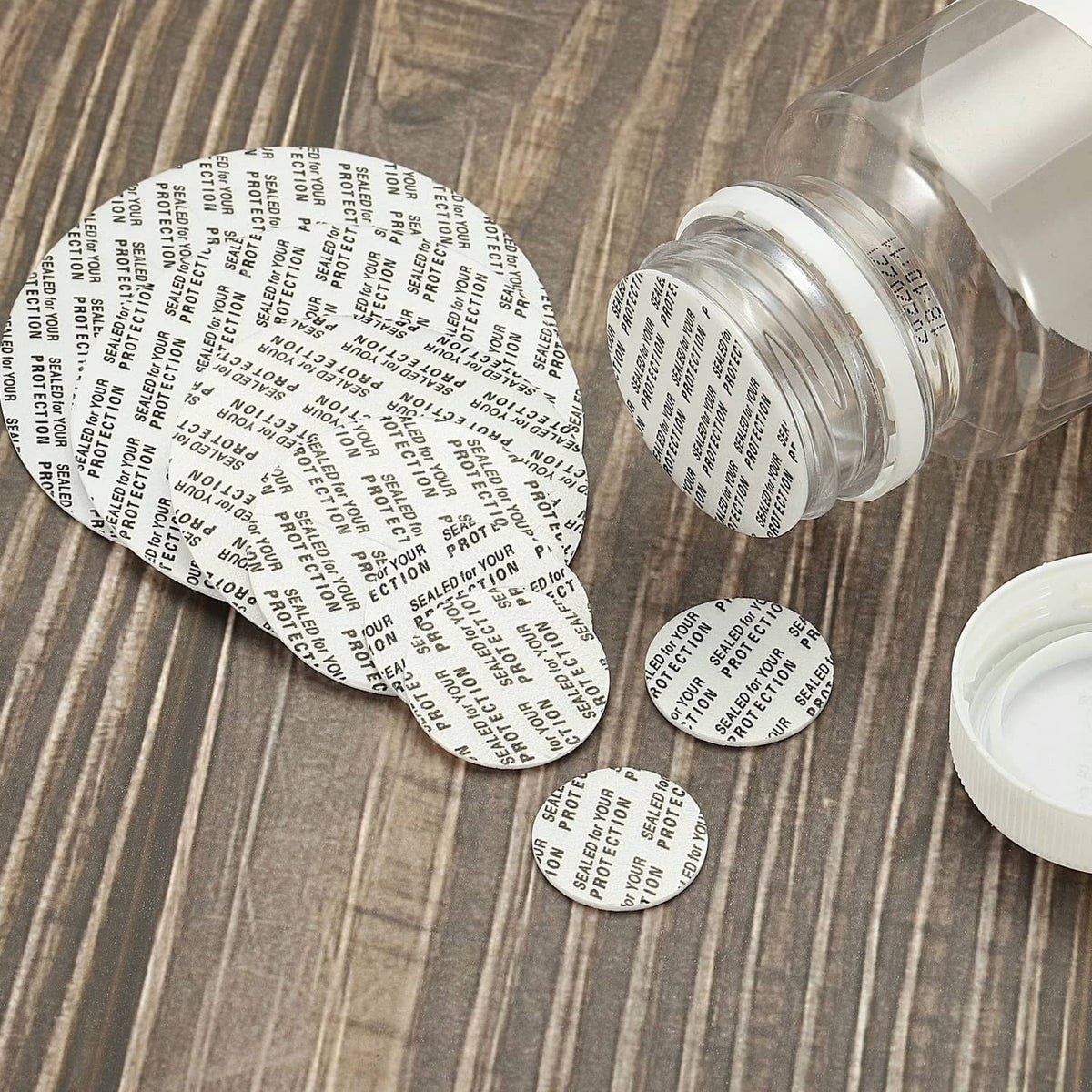 Foam lid liner discs and a container lid with white sealing rim