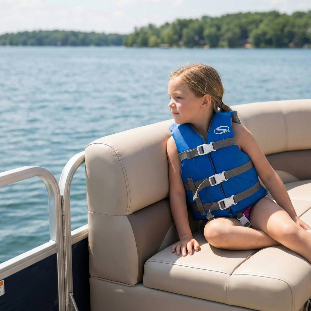 Blue kids life vest with gray webbing and front buckles, side view