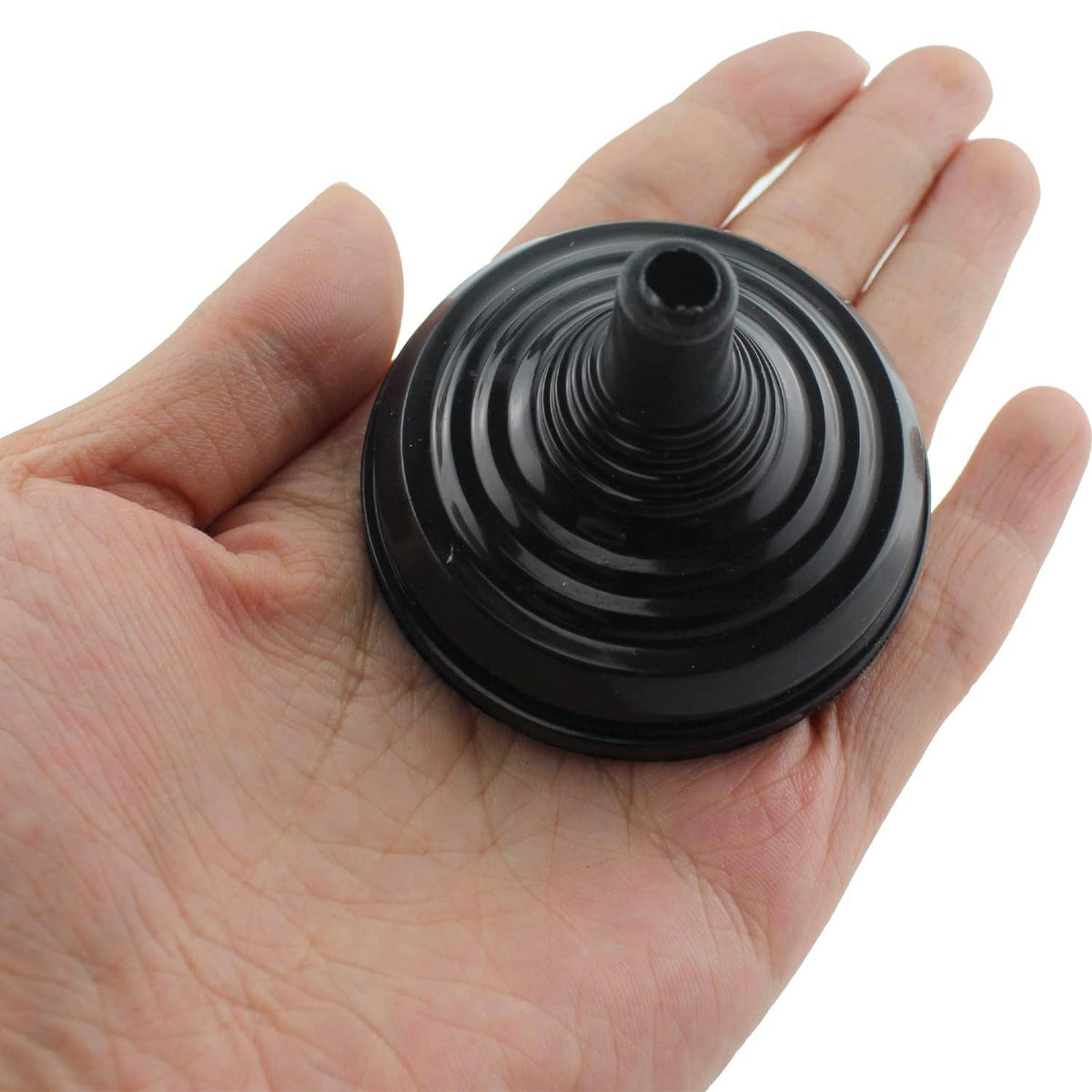Black plastic table flag pole base held in hand, ridged circular design