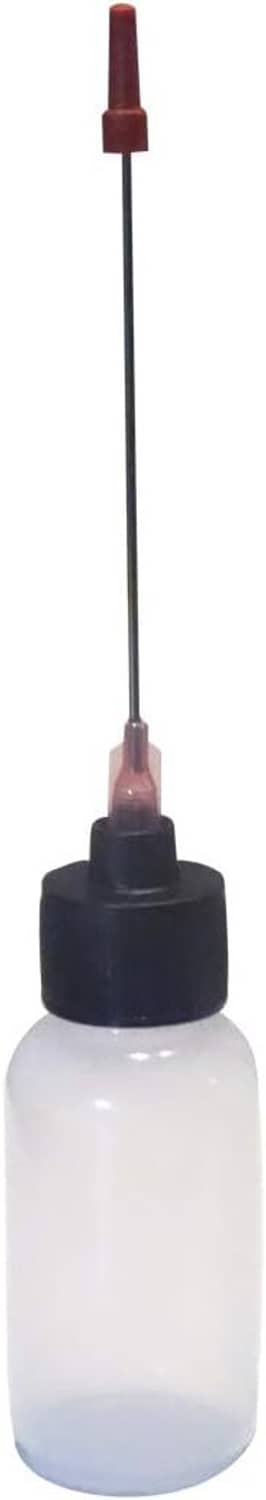 Dispensing bottle with red-tipped needle, black cap, and translucent body