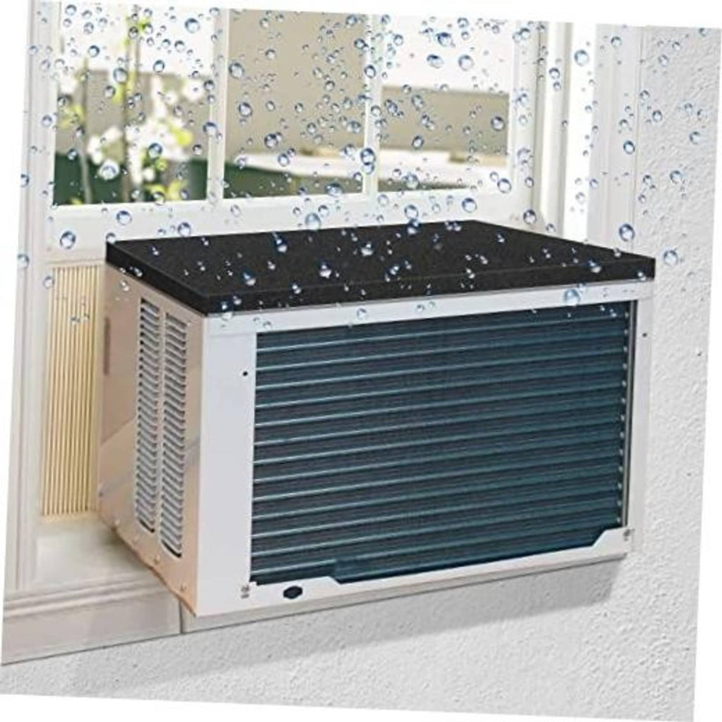 Black window AC drip cushion placed on top of a window air conditioner unit.