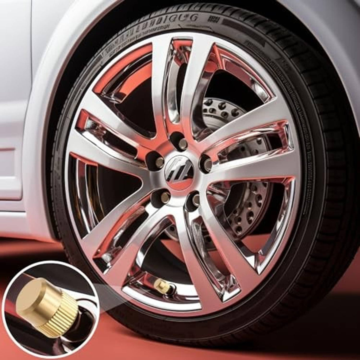 Gold valve stem cap with red inner seal, inset close-up near a car wheel.