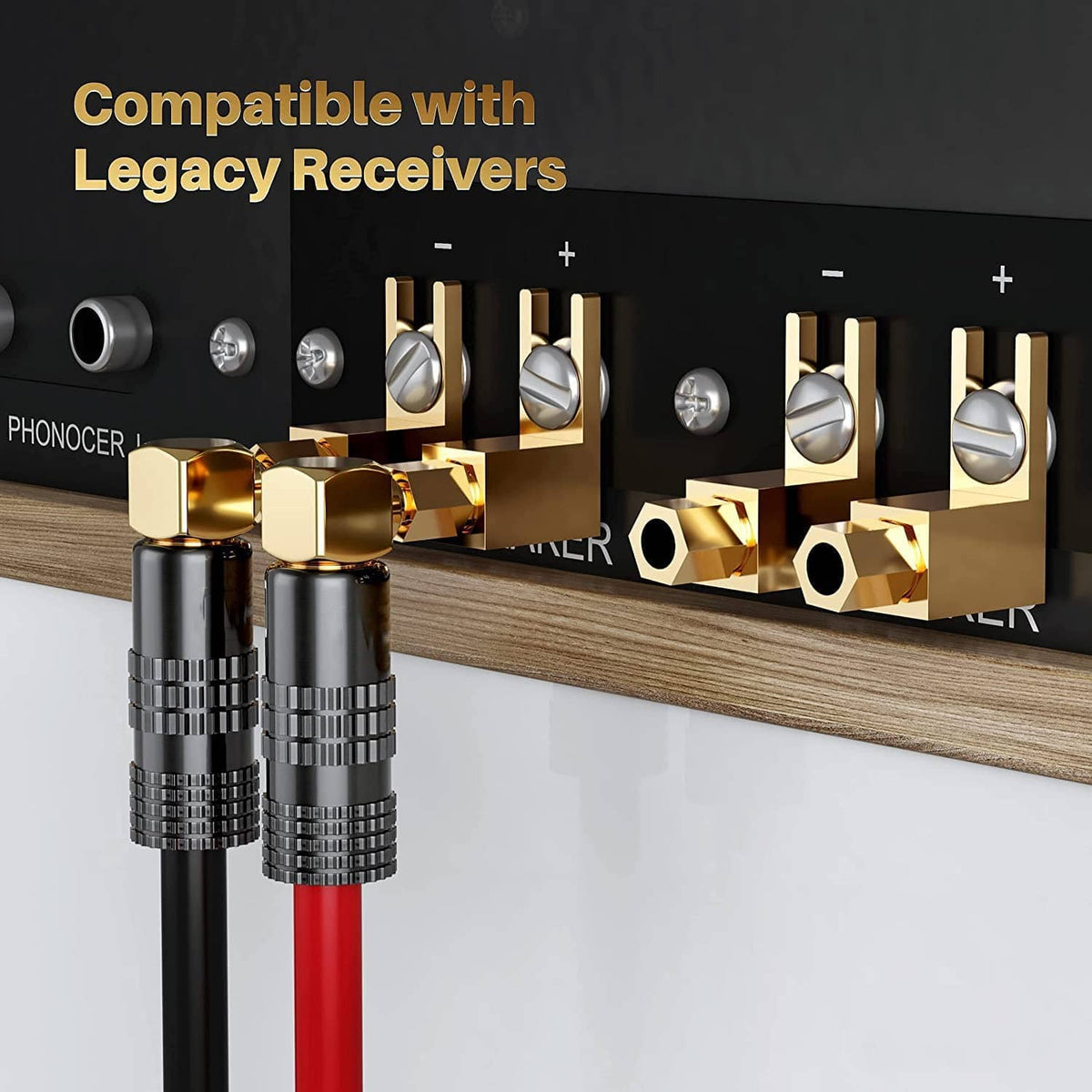 Gold spade plug connectors installed on a black receiver panel with metal terminal openings
