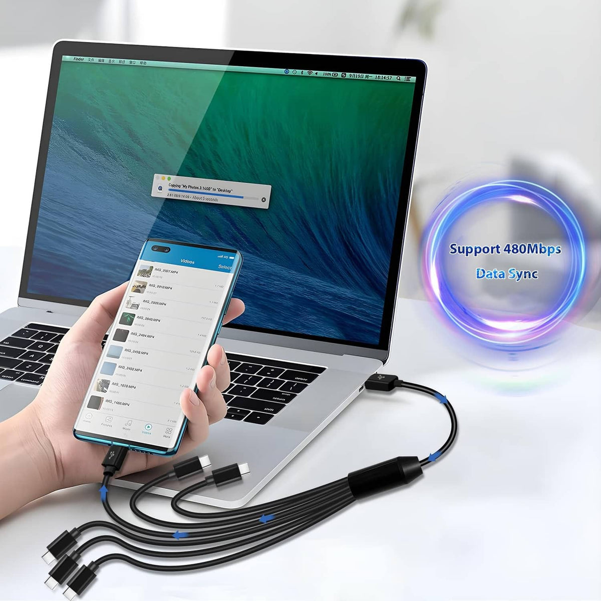 Black multi-connector charging cable connected to phone and laptop with data sync