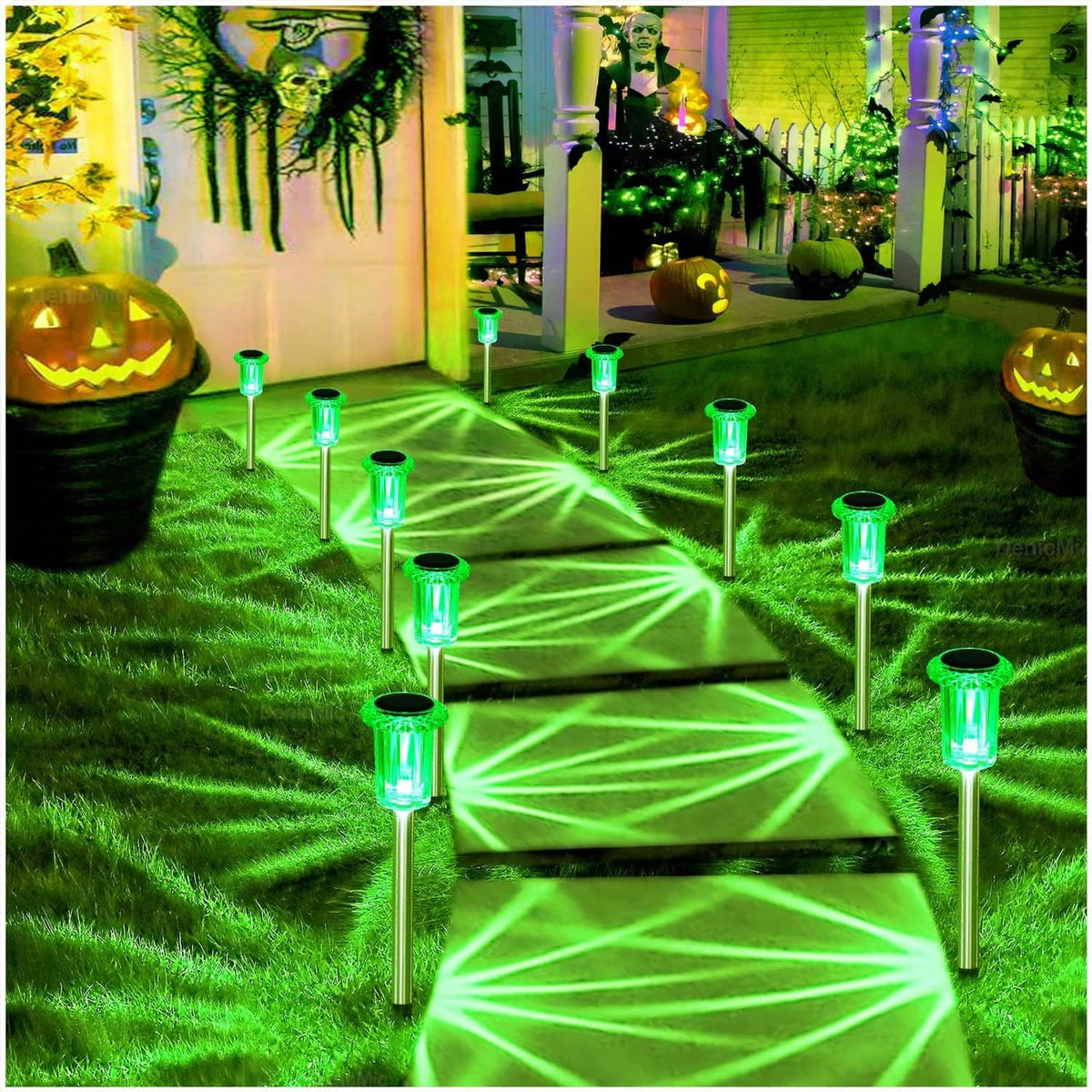 Green solar Halloween pathway lights glowing along garden steps and lawn