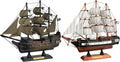 Wooden pirate ship model with dark hull and green sails, on a display stand