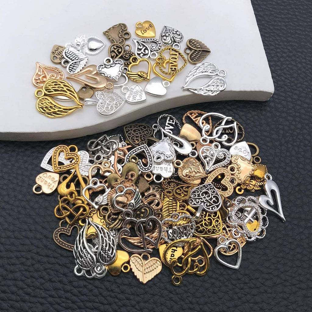 Mixed metal heart charms, some stamped with Love, for jewelry making, assorted colors