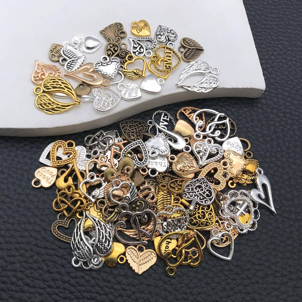 Mixed metal heart charms, some stamped with Love, for jewelry making, assorted colors