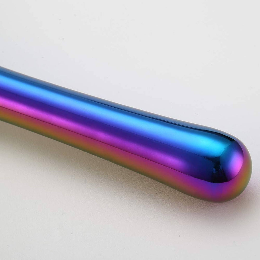 Rounded tip of an iridescent stainless steel cocktail muddler handle
