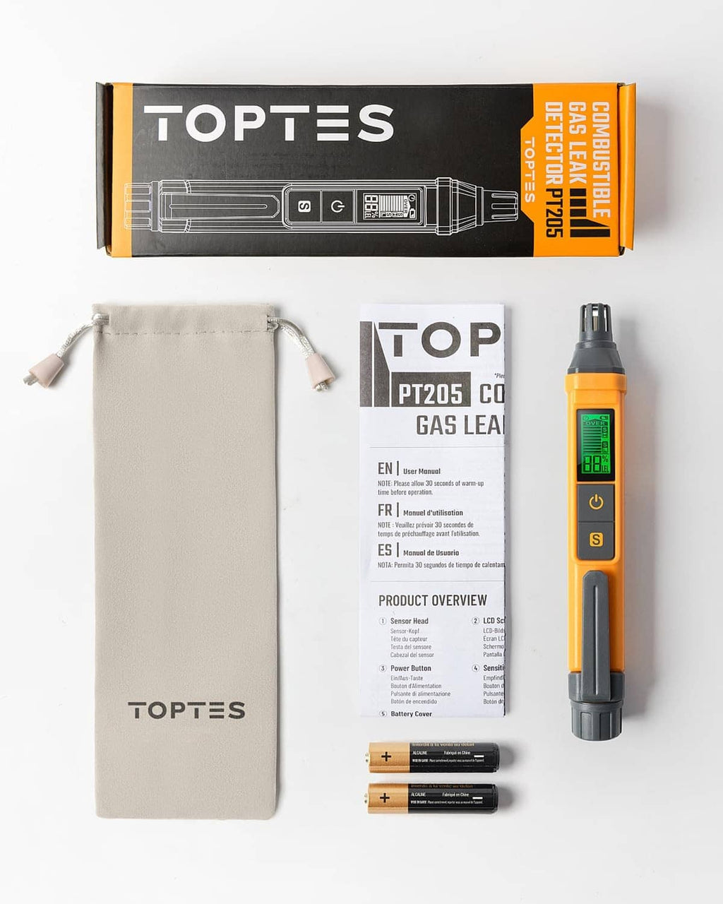 TOPTES orange gas leak detector kit with pouch, manual, and two AA batteries.