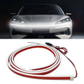 White LED hood light strip glowing on car front
