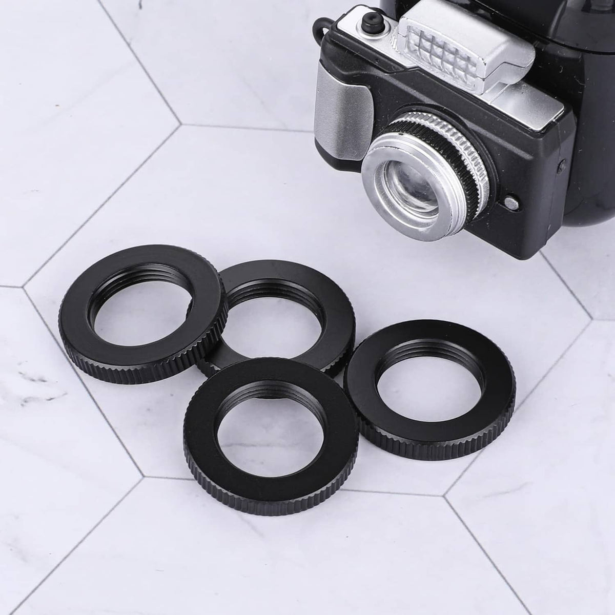 Set of four black knurled microphone stand lock nuts, 5/8-27 threaded