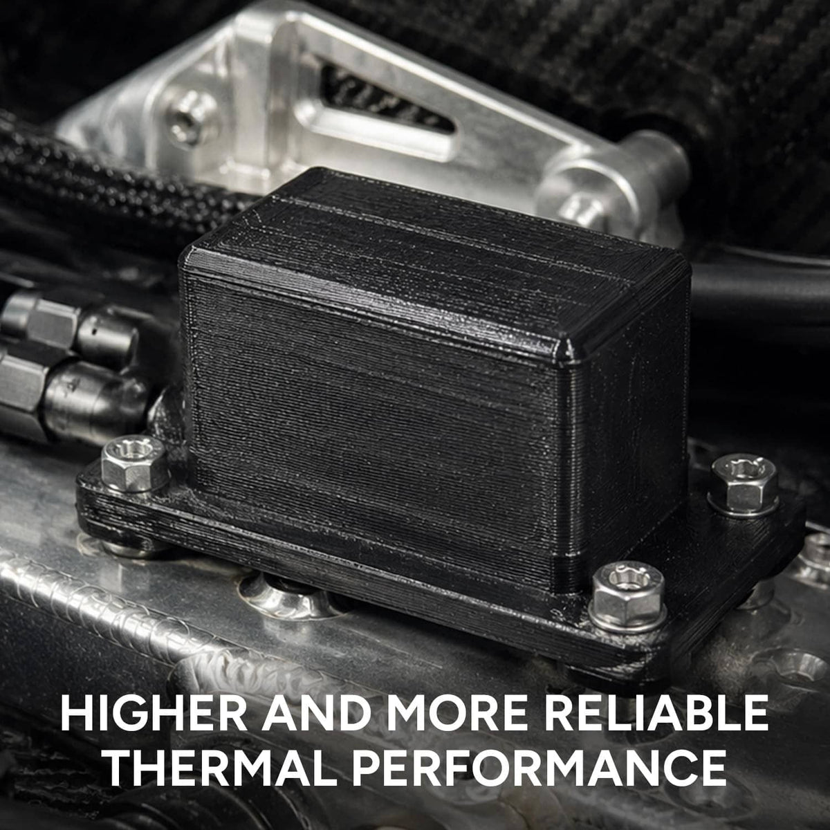 Black 3D printer heater block mounted on metal frame