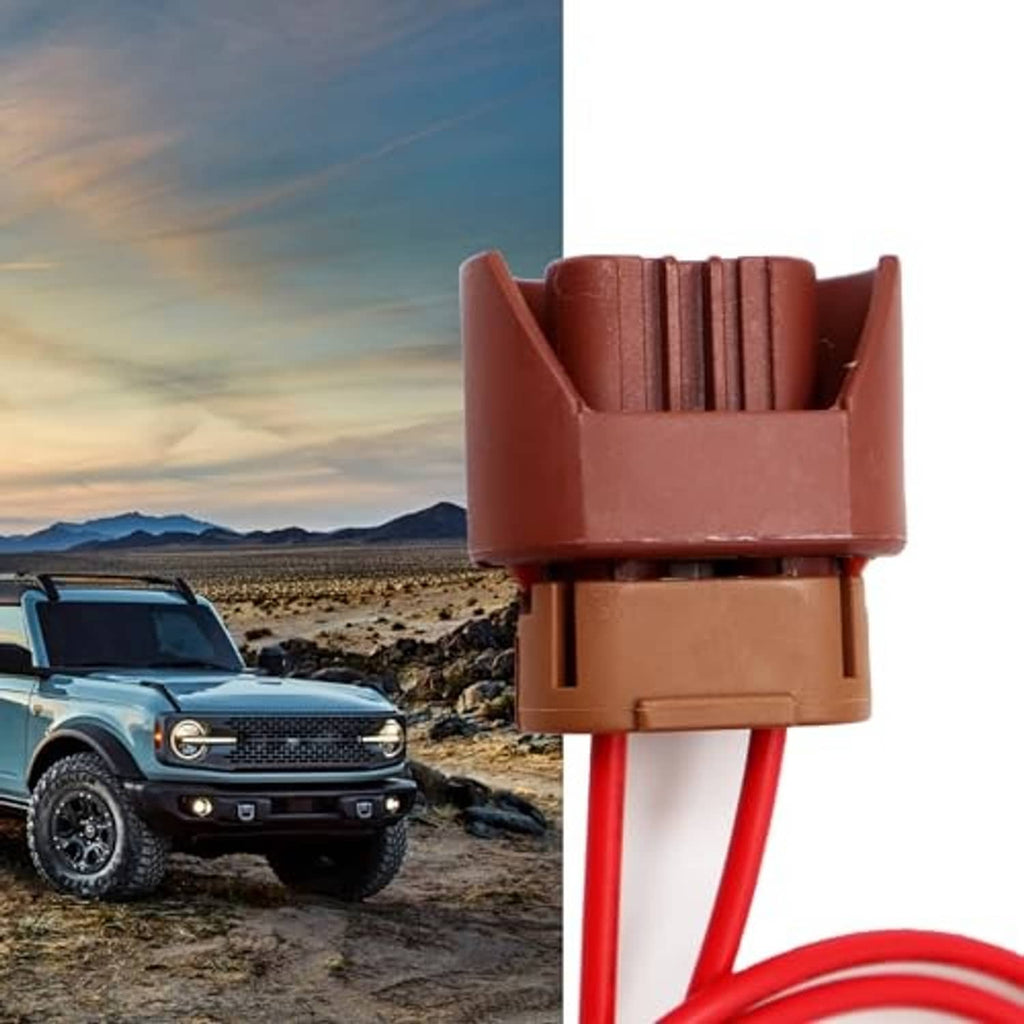 Brown automotive headlight connector with red cables