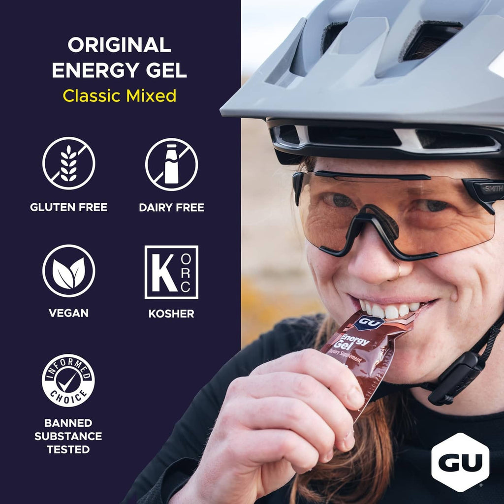GU Original Energy Gel Classic Mixed pouch held by cyclist wearing sunglasses