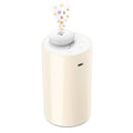 White cylindrical waterless essential oil diffuser with mist nozzle on top