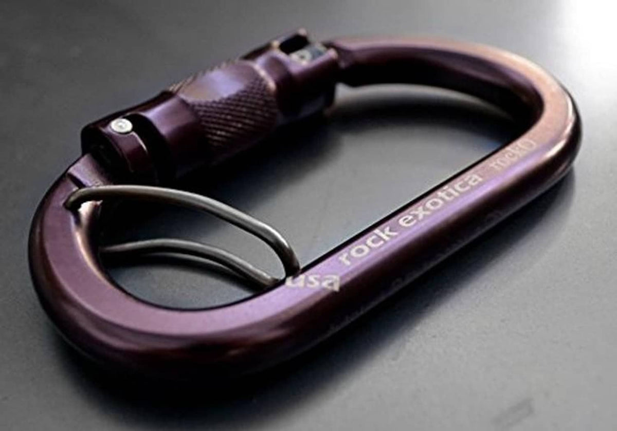 Heavy duty carabiner with locking sleeve and curved gate, dark purple finish with marking.