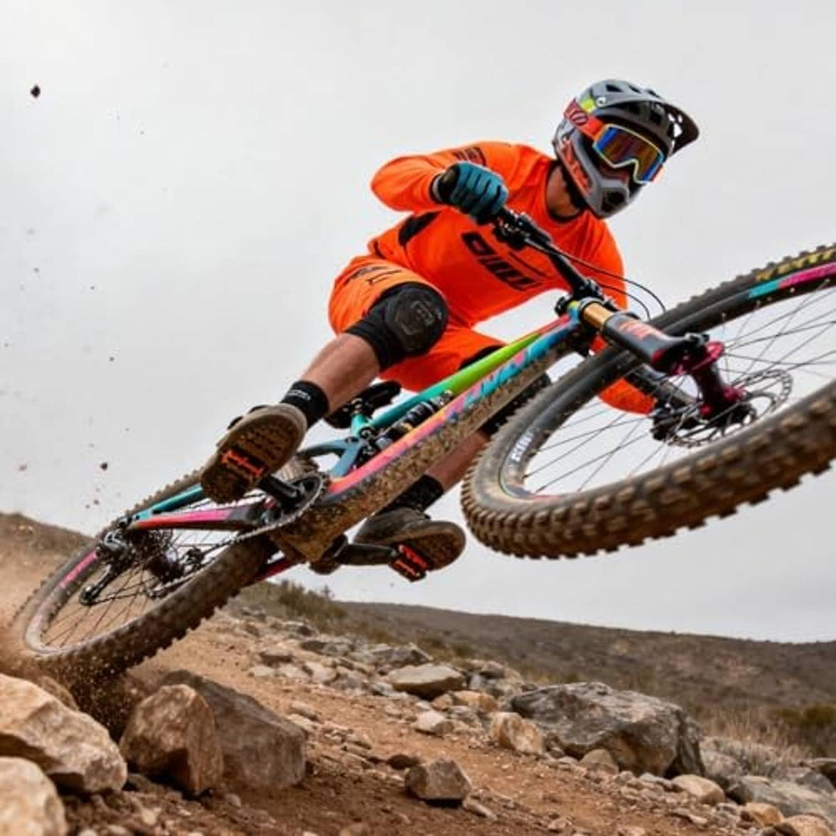 Black ribbed handlebar grips on an off-road bicycle during riding