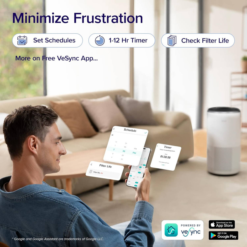 Cream white air purifier near a couch with app schedule shown on phone