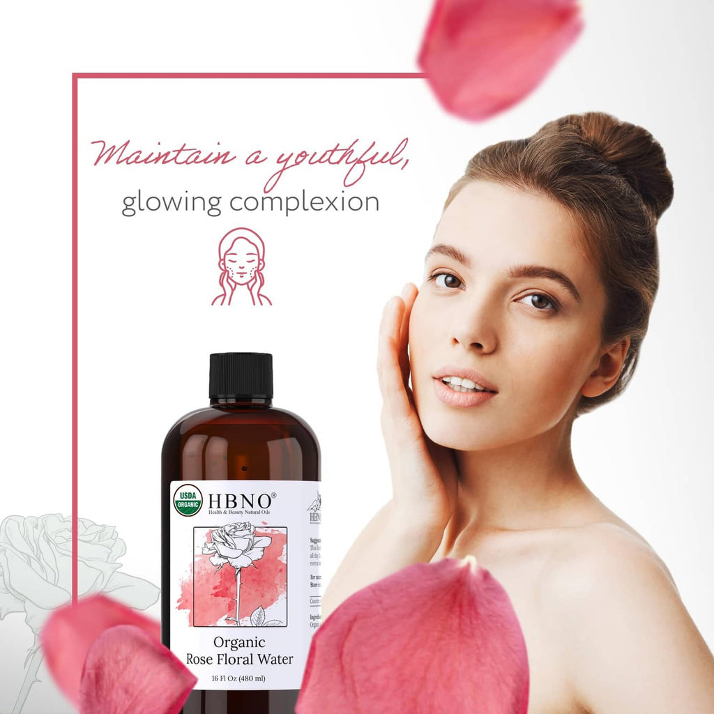 Amber rose water bottle with black cap near woman's face, beauty skincare theme