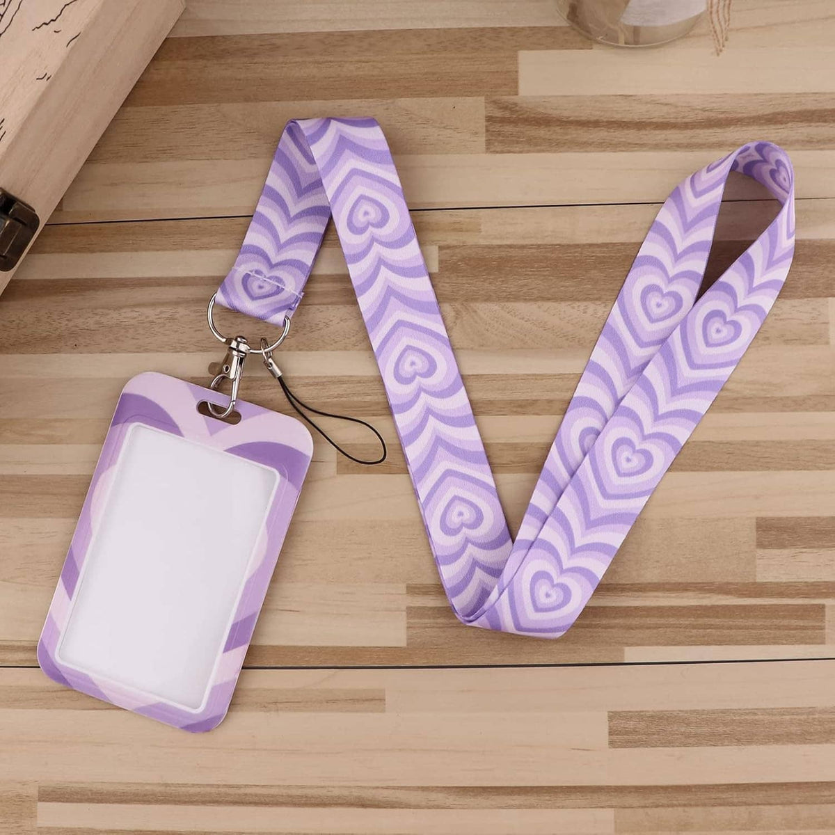 Purple heart-pattern lanyard with attached ID card holder and swivel clasp