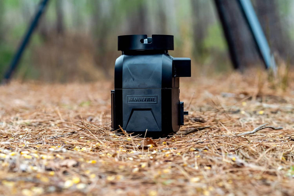 Directional feeder kit on ground stake, matte black hopper housing close-up