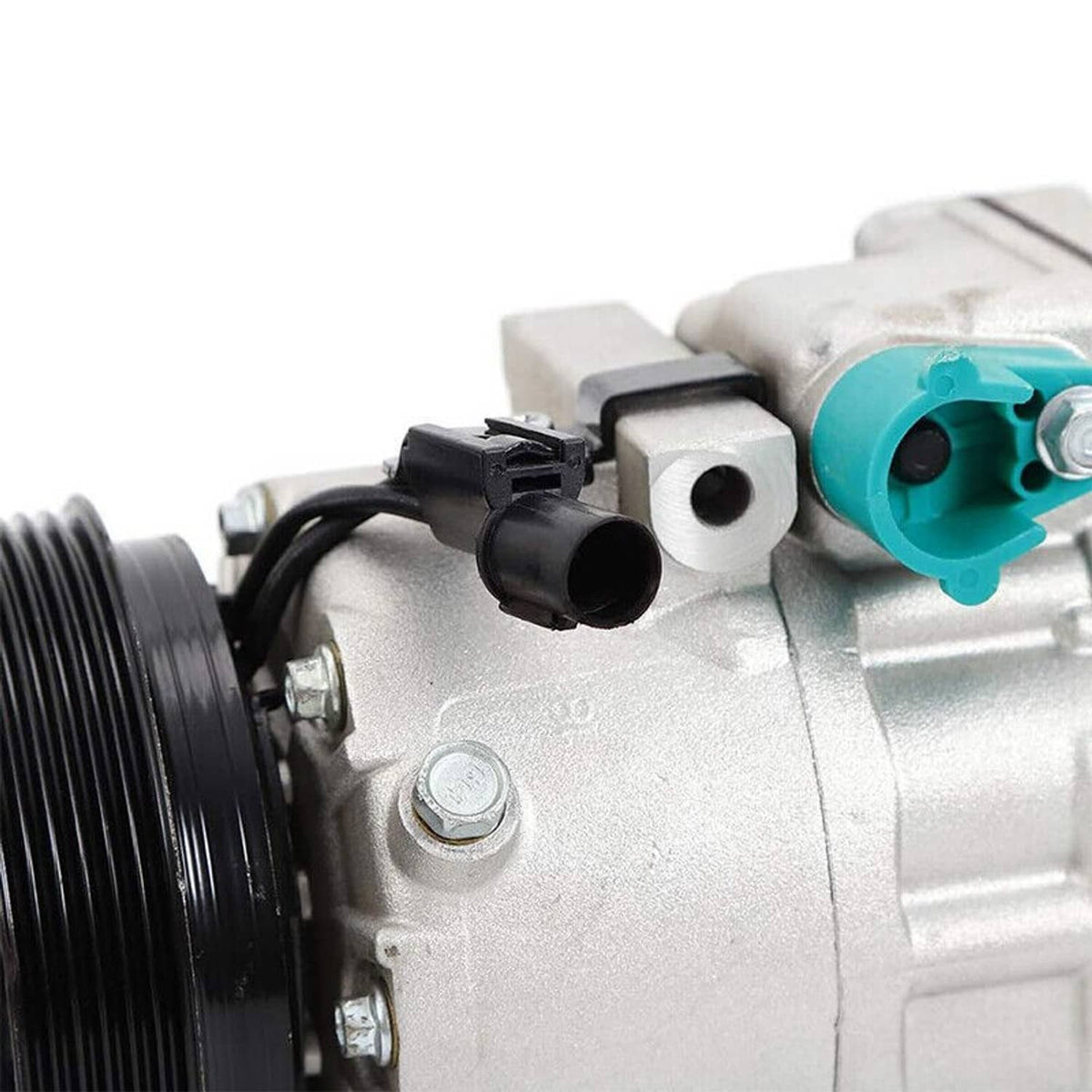 A/C compressor with clutch, close-up of teal port and black wiring connector on silver body