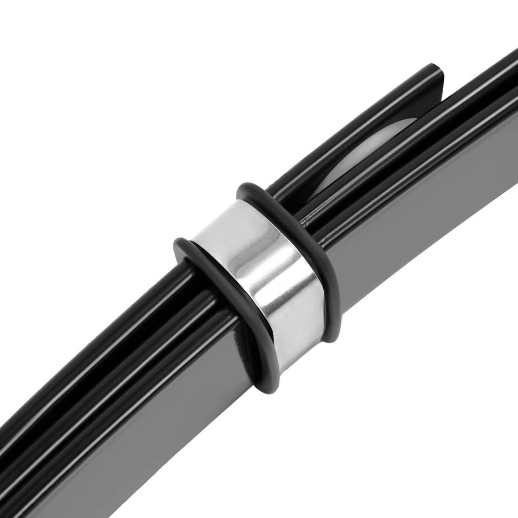 Close-up of black leaf spring pack with silver clamp ring and stacked steel leaves