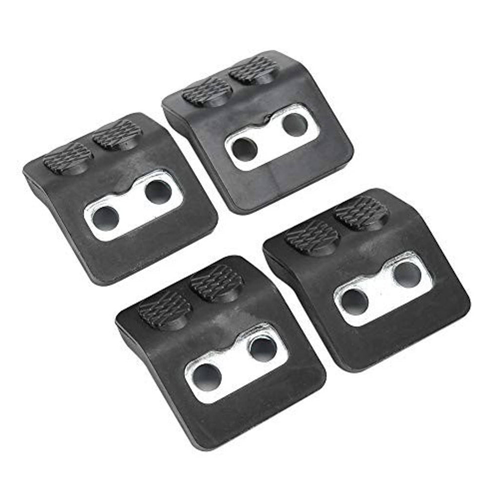 Four black tire changer jaw protectors, each with textured rubber pads and silver mounting holes