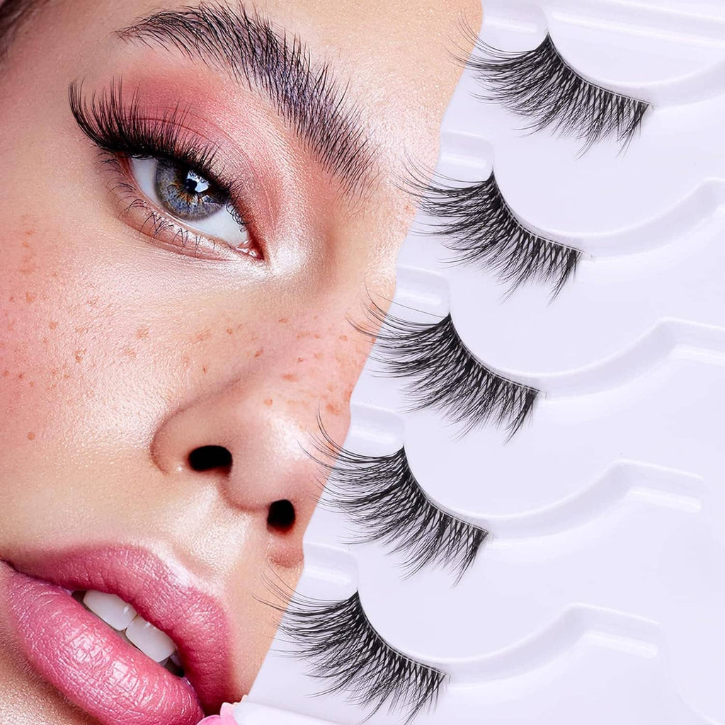 Wispy 3/4 false eyelashes with clear band, multiple pairs shown beside a model eye
