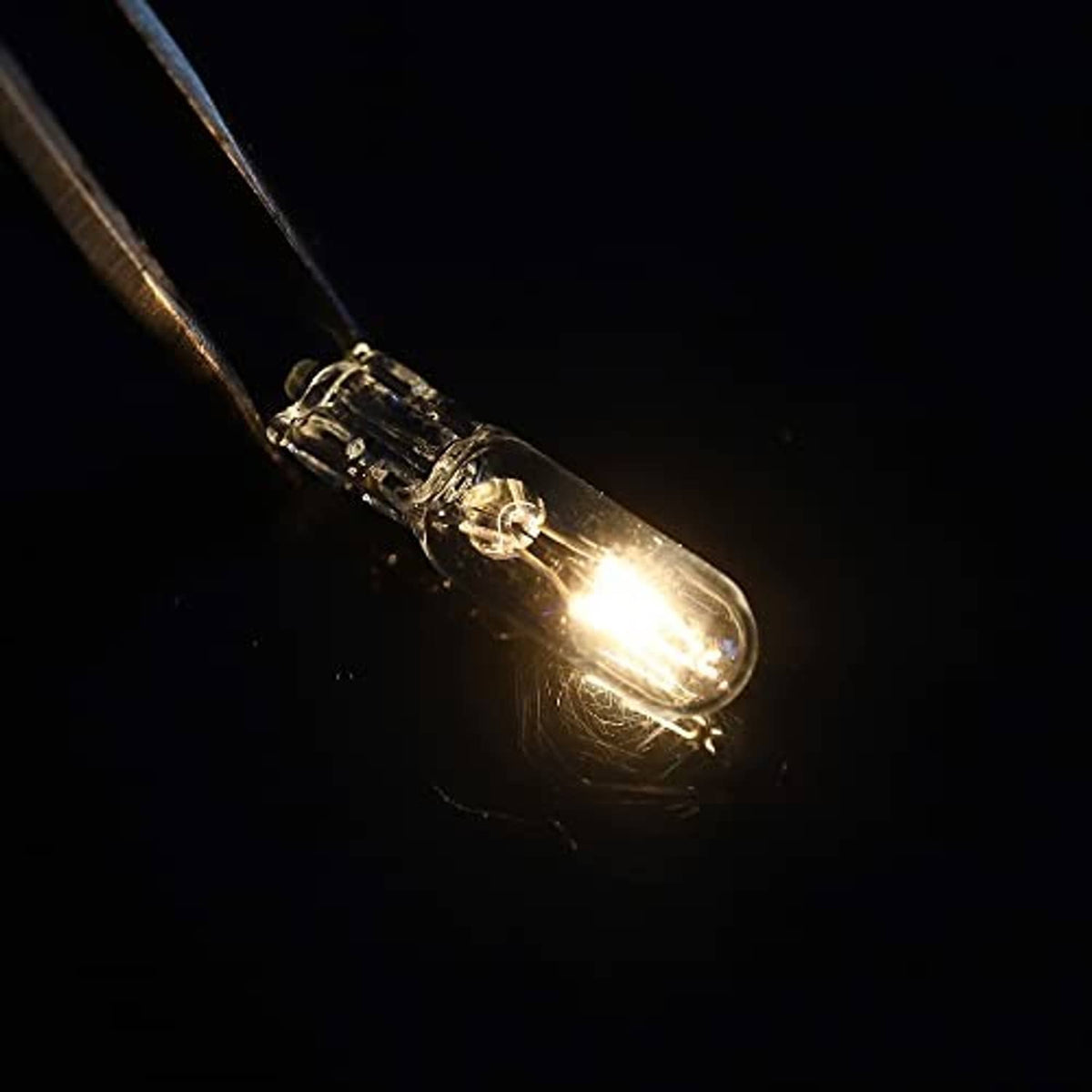Lit T5 W1.2W LED dashboard bulb with bright warm glow