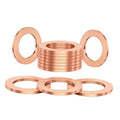 Red copper crush washer set, circular rings with center holes around an M14 fitting