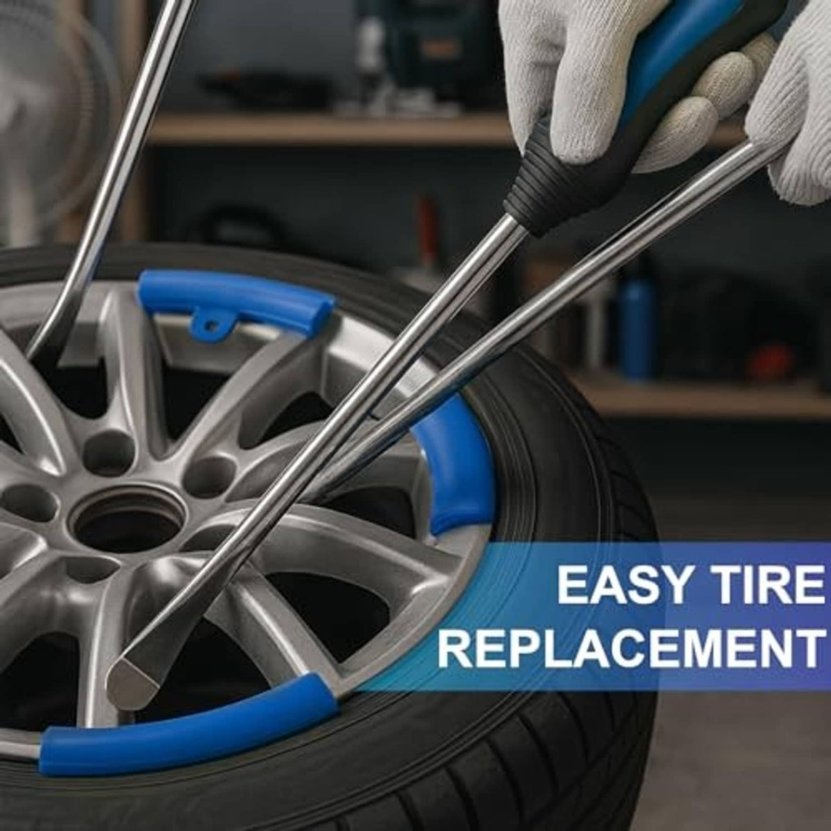 Tire spoon lever using blue-handled tools to lift a tire bead from a wheel rim