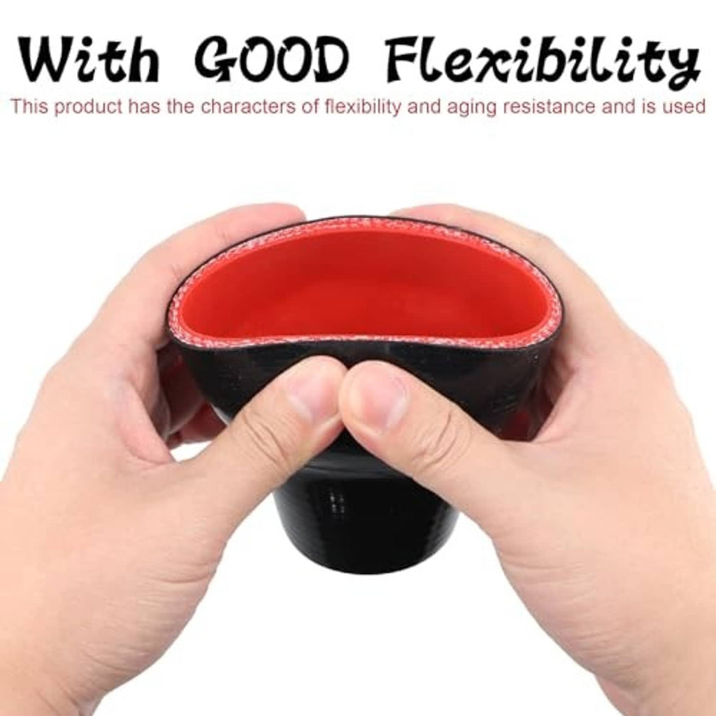 Black silicone reducer coupler held in hands, red inner opening and reinforced edge