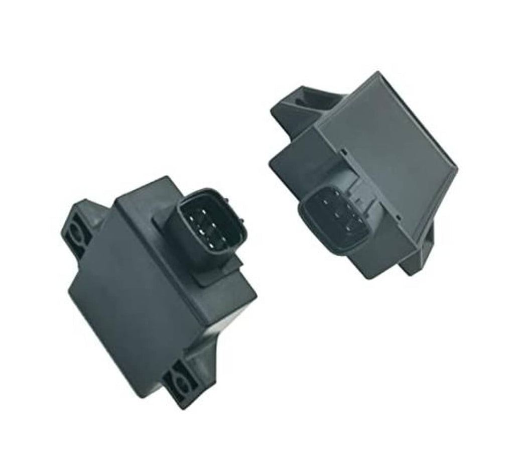 Pair of gray ignition control units with plug connectors