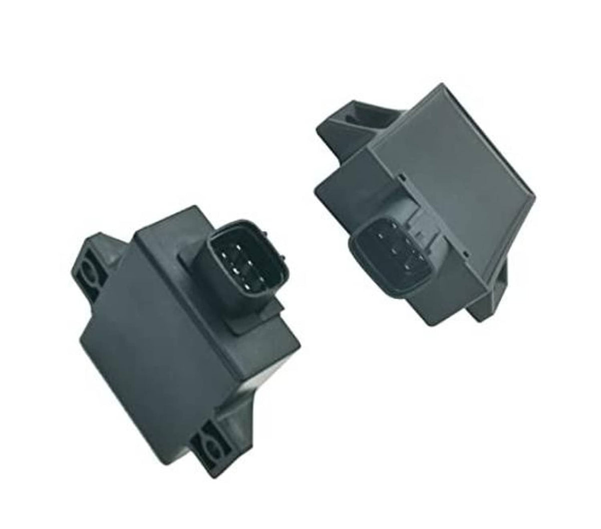 Pair of gray ignition control units with plug connectors