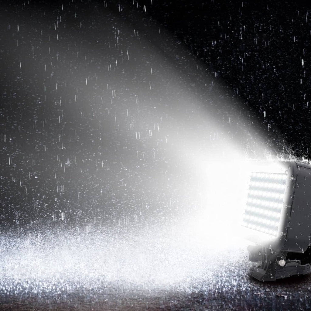 Underwater LED dive light casting a wide beam through misty water