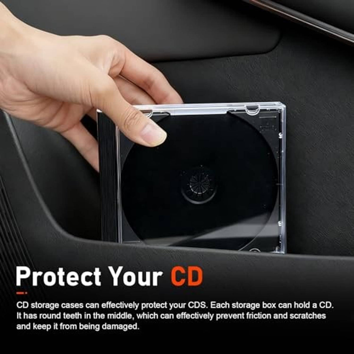 Hand holding open clear CD jewel case with black tray protecting a CD
