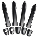 Set of black exterior door handles with chrome-silver accents and mounting holes (4 pcs).