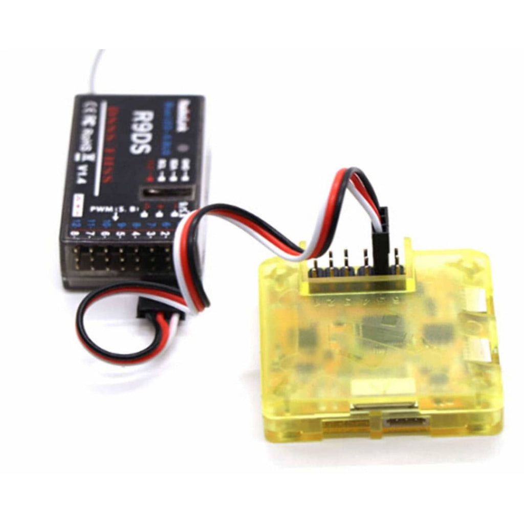 RC servo extension cables with black male plugs and tricolor wires connected to a controller