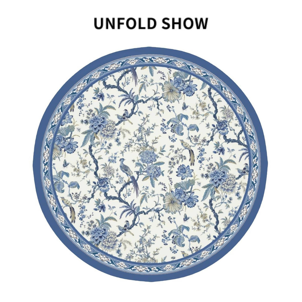 Round blue-and-white tablecloth pattern with blue border and floral bird design