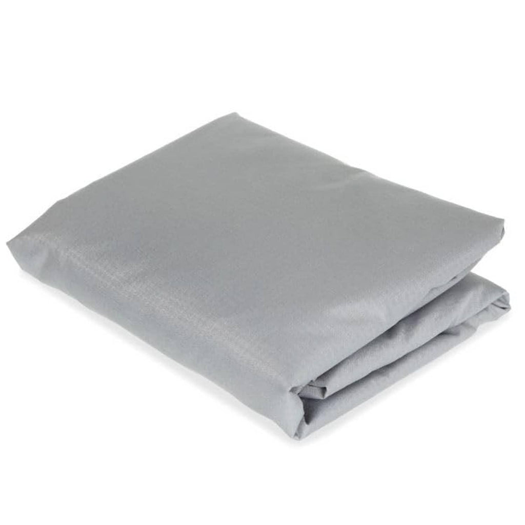 Stacked light gray canopy top cover fabric panels, folded for storage
