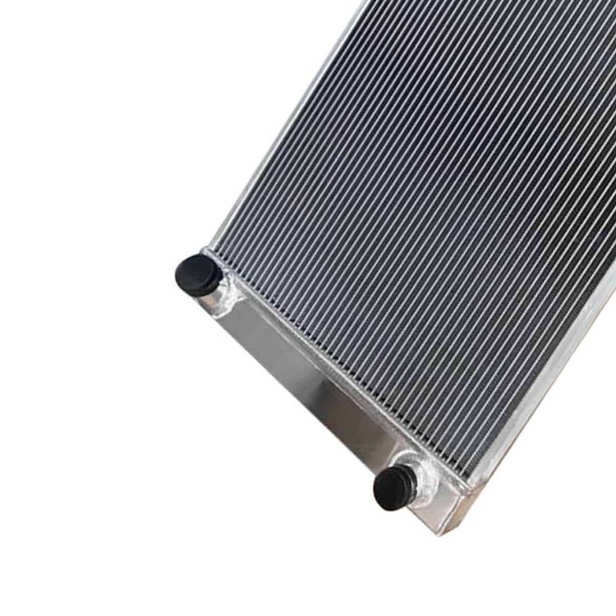 Aluminum radiator corner with black mounting caps and angled fin core