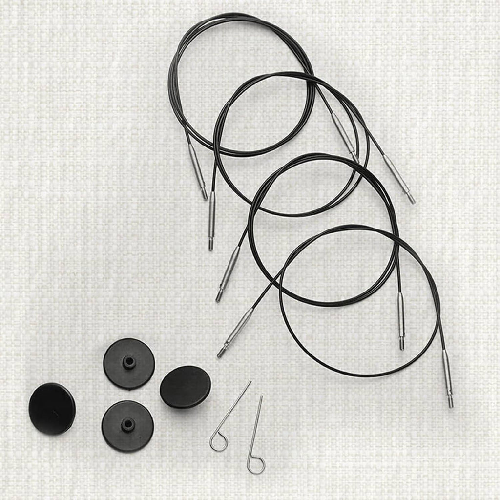 Black nylon-coated stainless steel circular knitting cables with silver needle tips and caps