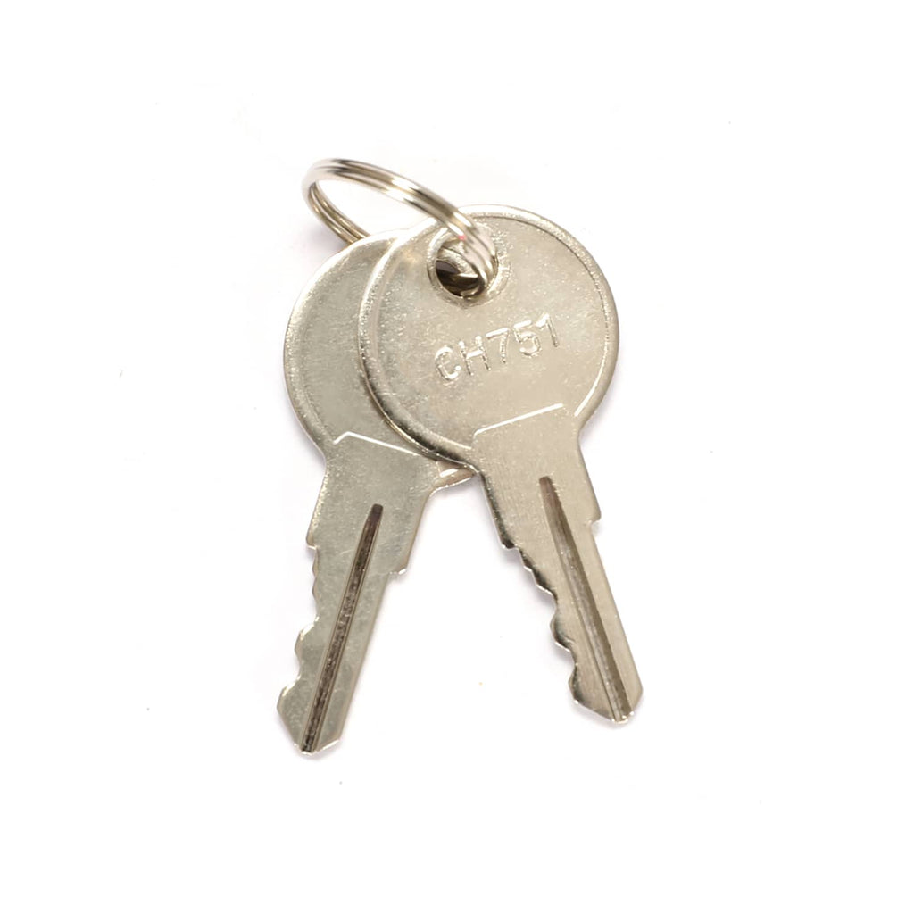 Metal key for dash locking door, showing stamped markings