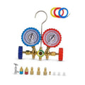 3-way AC manifold gauge set with blue and red pressure gauges and brass manifold